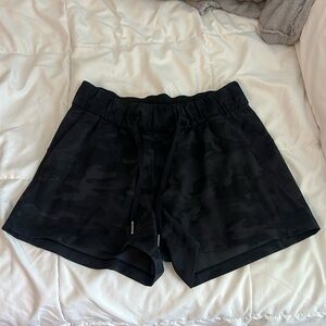 Lulu lemon on the fly short. Excellent used condition. Black/grey camo